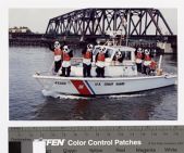 U.S. Coast Guard Auxiliary safety mascots on a boat
